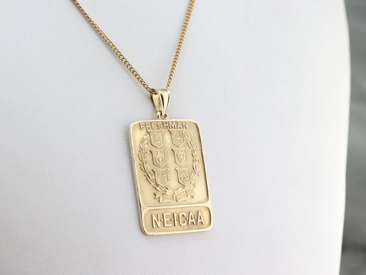 Antique Gold N.E.I.C.A.A. Freshmen Pendant