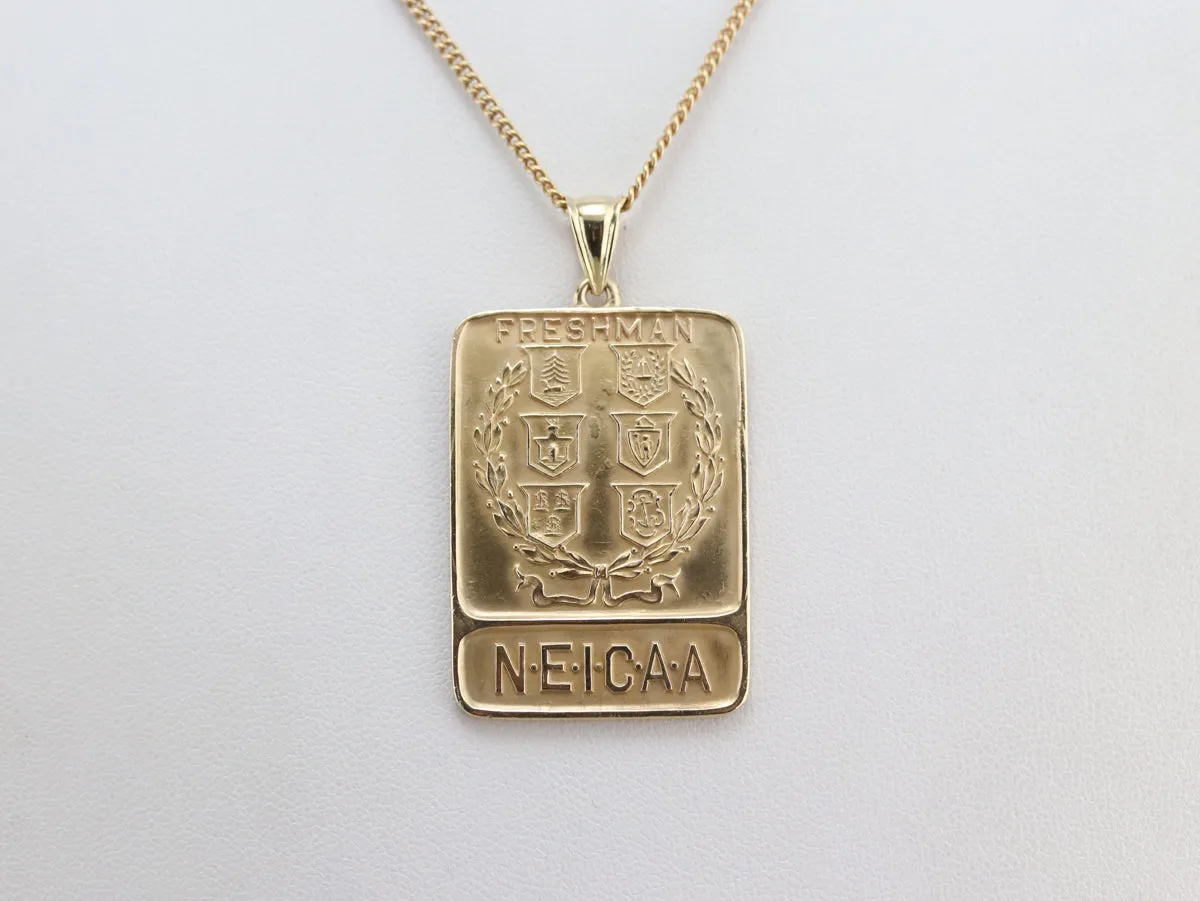 Antique Gold N.E.I.C.A.A. Freshmen Pendant